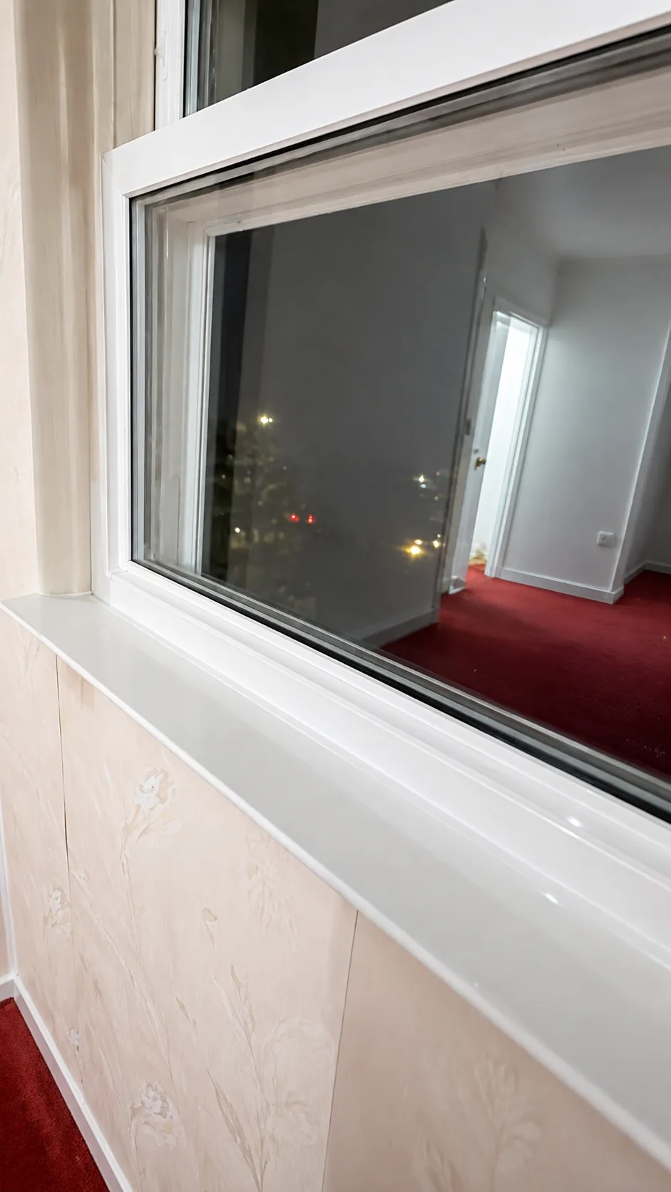 Close-up of a spotless window frame and sill detailed during a deep cleaning in Nassau County